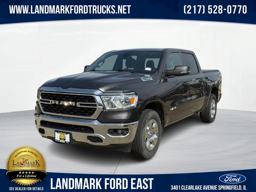 2023 RAM 1500 Lone Star 4x4 Crew Cab 5'7" Box in Granite Crystal Metallic Clearcoat — front three-quarter view