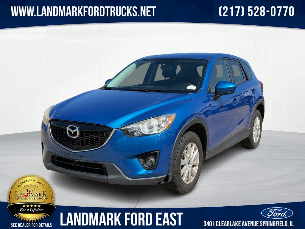 2014 Mazda Mazda CX-5 FWD 4dr Auto Touring in Blue Reflex Mica — front three-quarter view