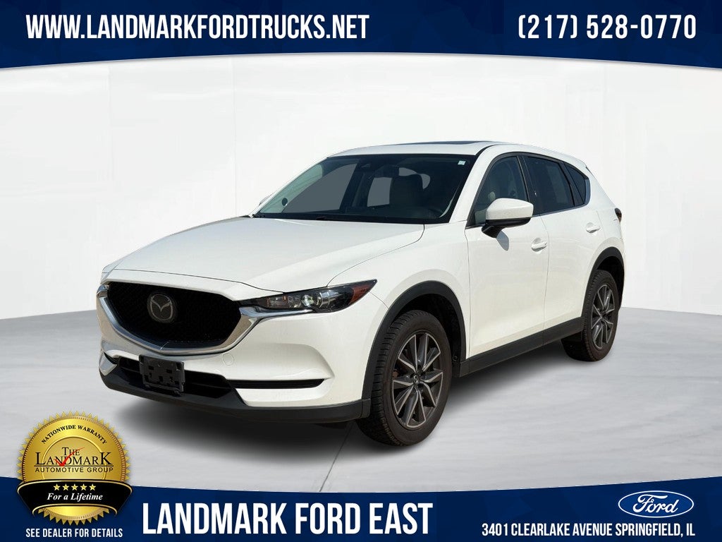 2018 Mazda Mazda CX-5 Touring AWD in Snowflake White Pearl Mica — front three-quarter view