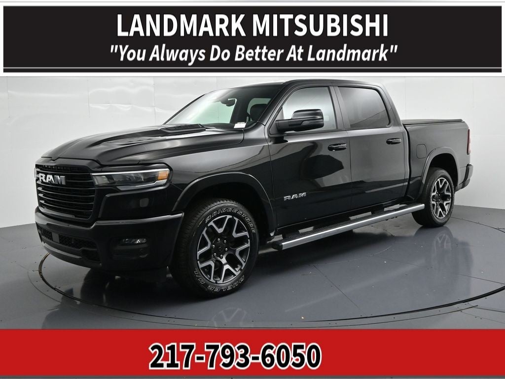 2026 RAM 1500 Laramie 4x4 Crew Cab 5'7" Box in Diamond Black — front three-quarter view