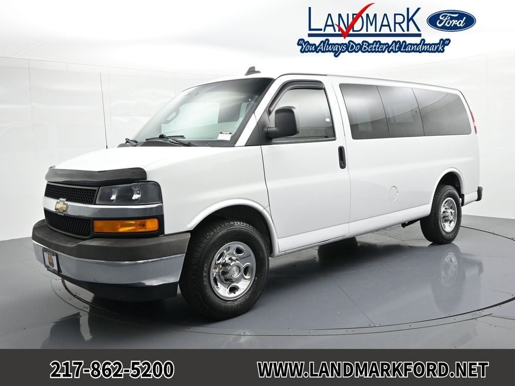 2018 Chevrolet Express Passenger RWD 3500 135" LT in Summit White — front three-quarter view