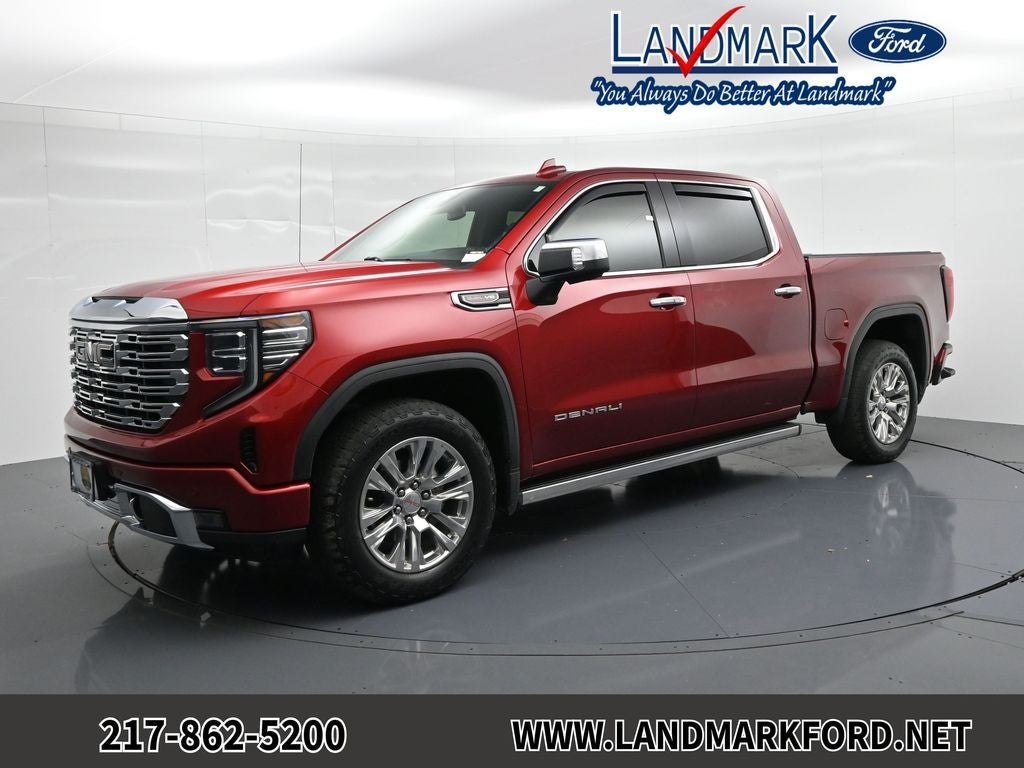 2023 GMC Sierra 1500 Denali in Volcanic Red — front three-quarter view