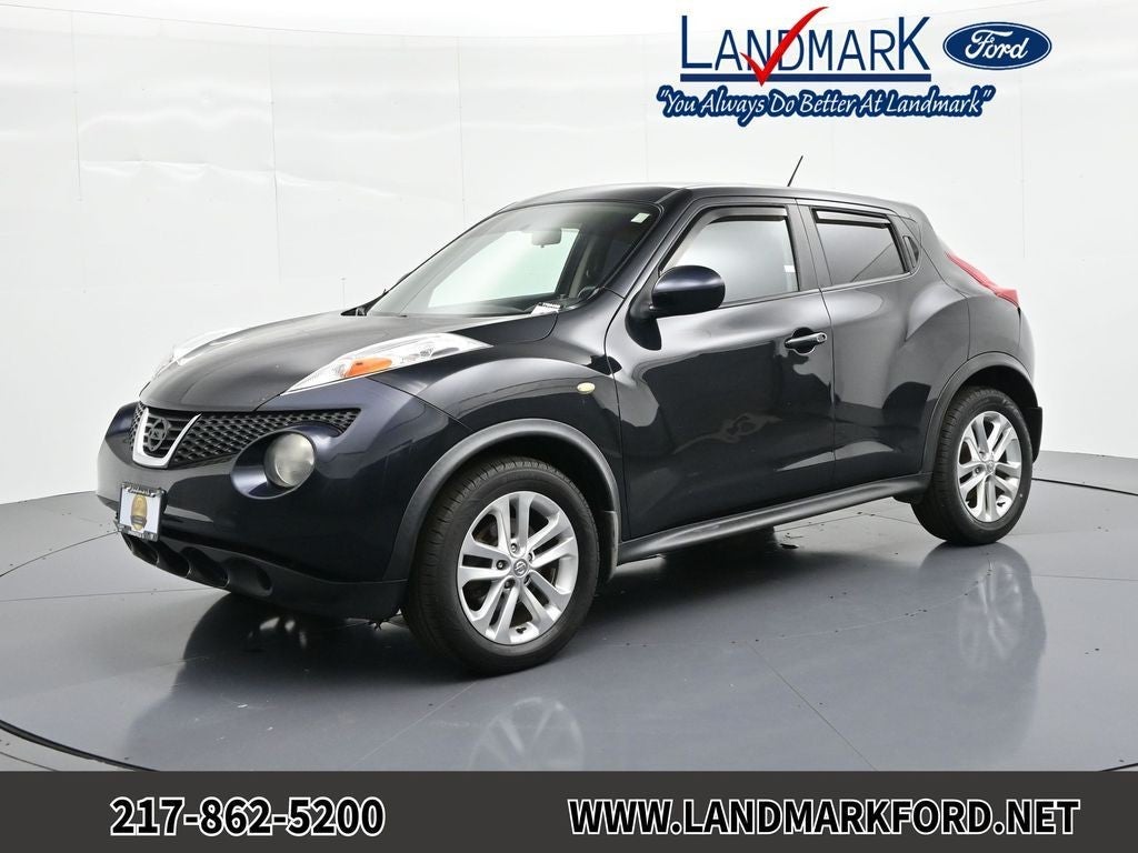 2013 Nissan JUKE SV in Sapphire Black — front three-quarter view